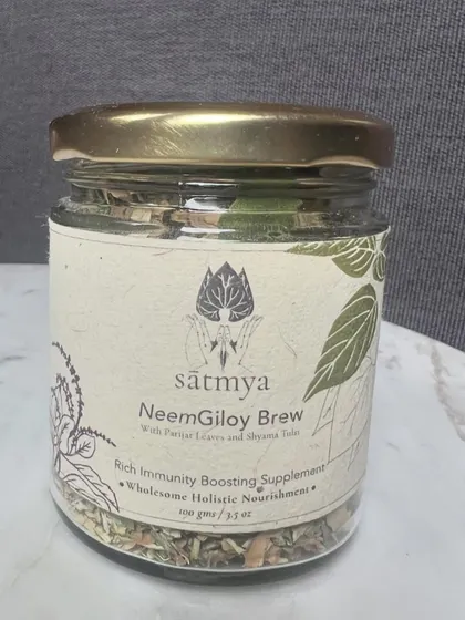 A jar of Neem Giloy Brew. This powerful blend is excellent for boosting immunity and fighting infections, a great example of using traditional herbs for modern wellness.