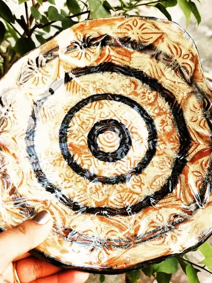 This handmade platter showcases the beautiful, earthy patterns created by the Obvara firing technique. Each piece is truly one-of-a-kind.