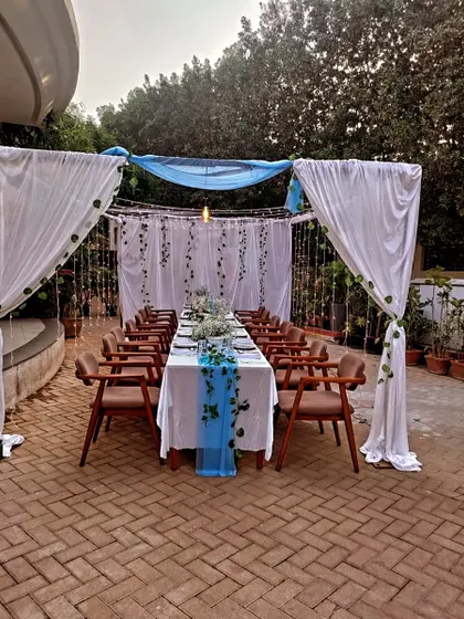 Another view of the long table setup for a candlelight dinner. This is perfect for celebrating an anniversary or a special milestone with close family and friends.