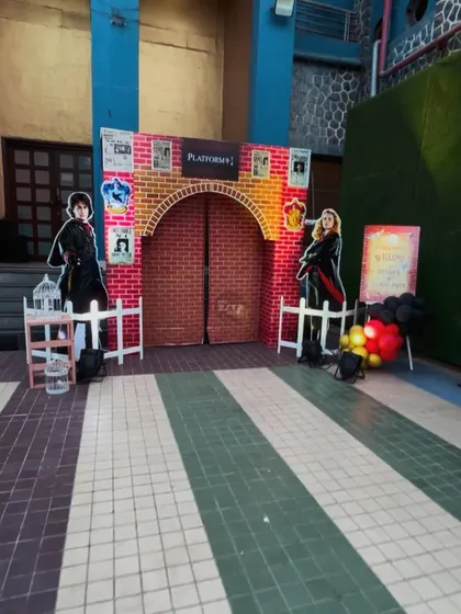 The entrance to the party, a perfect recreation of Platform 9 3/4, ready for young wizards and witches to run through.