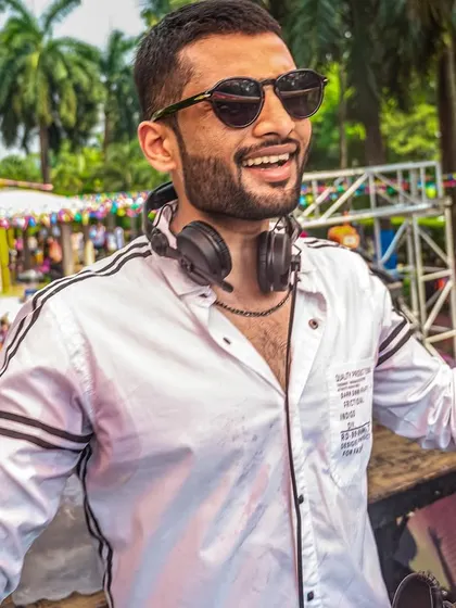 A candid shot from the Holi party, completely in my element. The joy on everyone's faces is what makes these events so special.