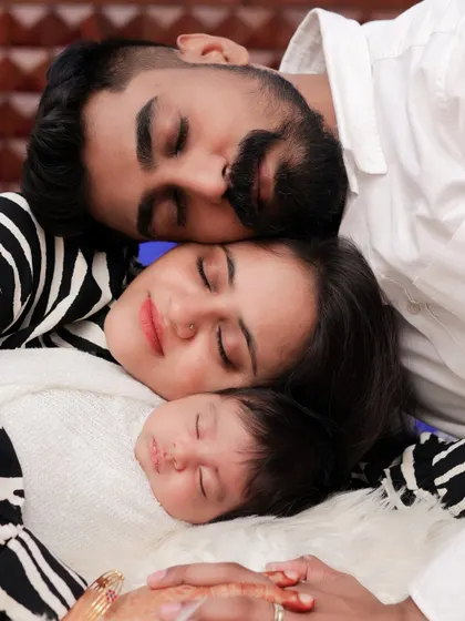 The quiet moments right after a baby arrives are my favorite. This peaceful portrait of a new family, all resting together, captures the incredible bond and love that fills the room. It’s a memory of pure serenity.