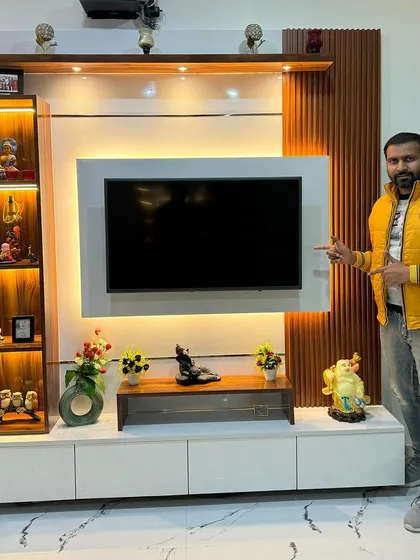 A beautiful TV panel design featuring a backlit panel, open display shelves, and a floating console. It's a complete solution for a modern living room.