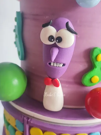 The 'Fear' character from the 'Inside Out' cake, handcrafted with all his nervous energy. It's so rewarding to see all the different emotions come together on one cake.