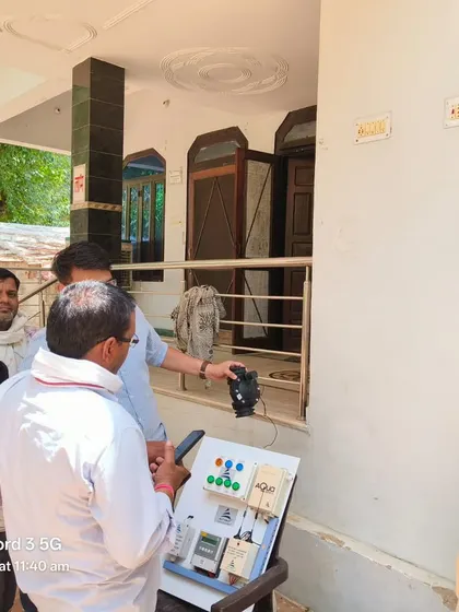A hands-on demonstration of our automation control panel during a farmer meeting in Jaipur. Practical demos help farmers understand the benefits of our technology.