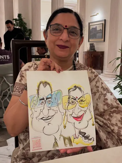 A lovely couple's caricature being held by a family member, capturing the essence of togetherness.