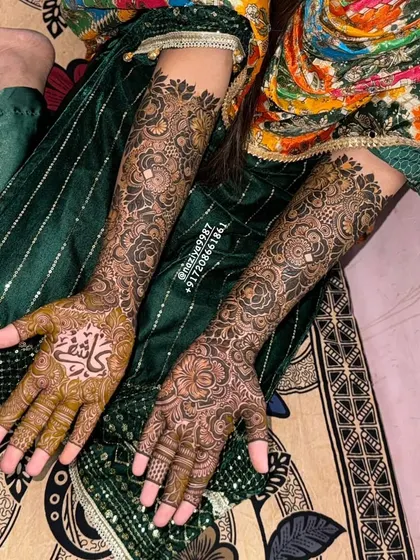 Another view of the engagement design, showing the name 'Kashif' clearly on the palm. The rest of the hand is filled with my signature intricate floral work.