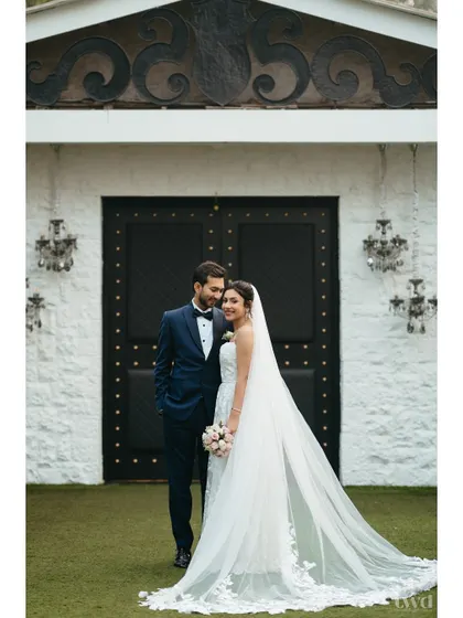 Another stunning portrait from the same series, with the groom lovingly looking at his bride. The chemistry between them is palpable.