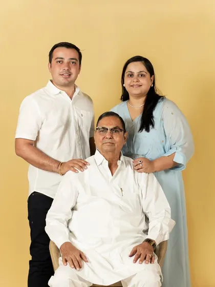 A beautiful portrait of a father with his adult son and daughter. It's a wonderful way to honor the head of the family.