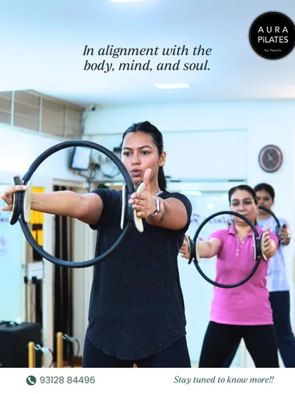 This image captures the essence of a group class using the magic circle. My goal is to bring everyone into alignment, not just with their own body, mind, and soul, but with each other.