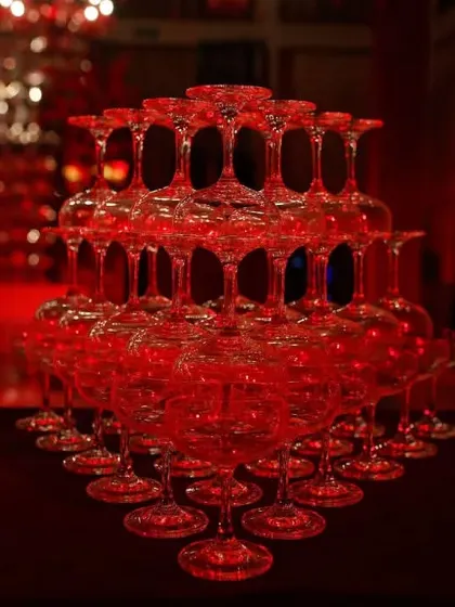 A heart-shaped champagne tower ready for the couple, a key feature of a glamorous Sangeet night we planned.