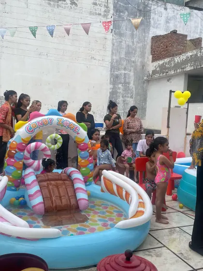 This inflatable pool with a candy-themed slide is a huge hit with the younger children. It provides hours of safe and fun water play.