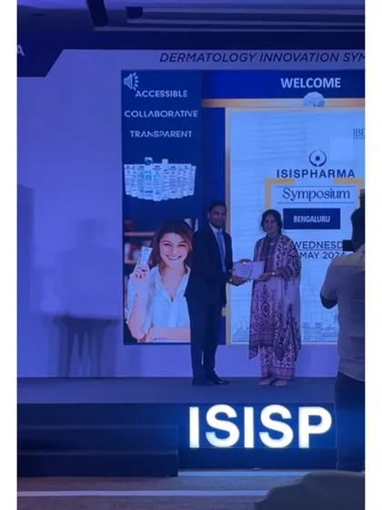 Receiving a certificate of appreciation for my participation as a panelist at the Dermatology Innovation Symposium. It is a privilege to contribute to these educational forums.