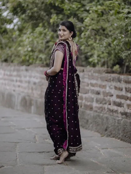 A graceful pose in my traditional Navari saree. The rich fabric and classic drape create a timeless and elegant look, perfect for a heritage-themed pre-wedding shoot.