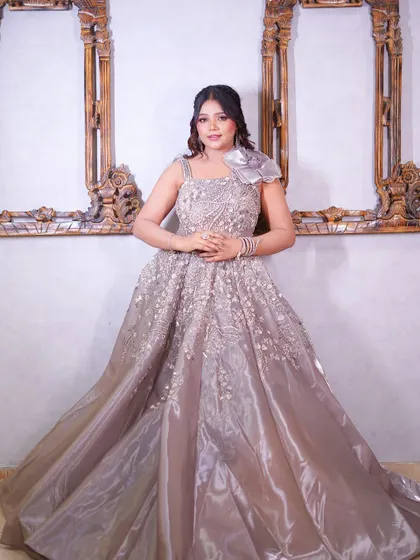 A full-length shot of the grey satin gown, a perfect choice for a formal evening event.