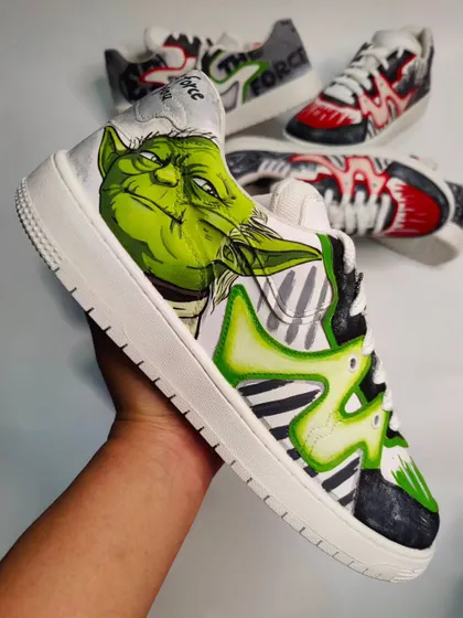 A detailed look at the Yoda-themed sneaker from the limited edition Star Wars collection. The design features vibrant greens and abstract waves to represent the power of the Force.