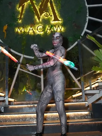 Posing in my Halloween costume at Macaw by Stories. I love how the pixel poi create colorful trails of light, adding a touch of magic to the spooky theme.