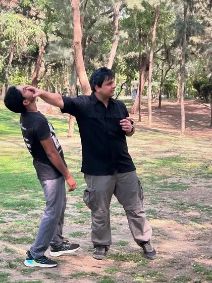 This is a real-world application of a palm heel strike. Notice the explosive upward motion, targeting the chin and jaw. This strike is designed to stun the opponent, disrupt their balance, and create an opportunity for follow-up attacks or escape.