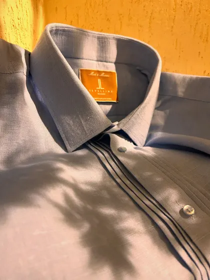 Another view of the custom linen shirt, highlighting the crisp collar and fine fabric. We use only 100% pure linen for maximum breathability.