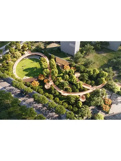 A key feature of the 'Poetry of Earth' project is the extensive network of landscaped parks, walking trails, and an amphitheater. This aerial view shows how these amenities are designed to create a rich and engaging environment for the community.