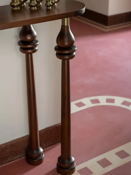 The foyer console from the Layam project, with legs inspired by the traditional Kerala 'Nilavilakku' or lamp. As the Nilavilakku symbolizes prosperity and new beginnings, it's the perfect element to greet guests as they enter the home.