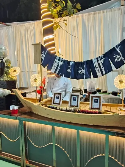 To create a real "wow" moment, I designed this custom sushi boat station. It serves as a stunning centerpiece and offers guests a selection of freshly prepared sushi, bringing a touch of Japanese elegance to the event.
