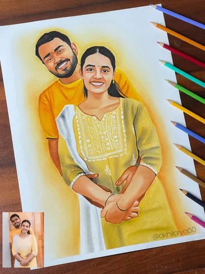 This couple portrait in matching yellow outfits has such a happy vibe. I used colored pencils on A3 paper to create a soft glow and highlight their coordinated look.