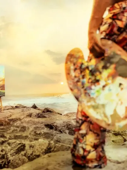 This closer outdoor photograph shows my palette and patterned trousers, with the ship painting on its easel in the background.