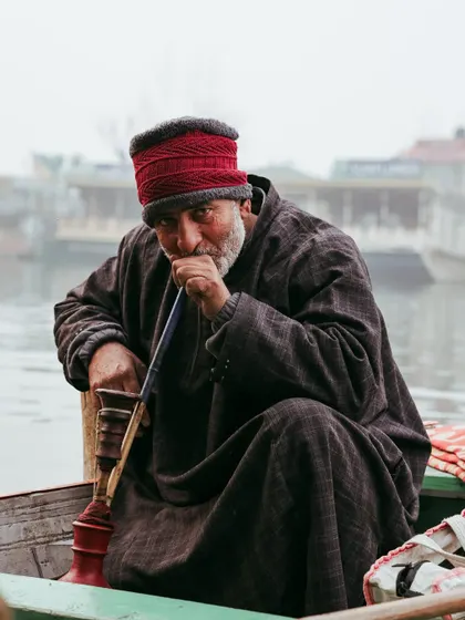 A boatman enjoying his hookah on the Dal Lake. These are the authentic, cultural moments I love to capture.