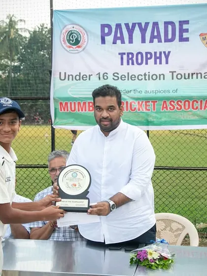 Recognizing individual excellence at the U-16 Payyade Trophy. One of our club officials presents an award to a young player for his outstanding performance during the selection tournament.