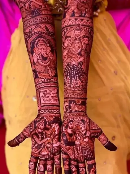 This design features a portrait of Lord Ganesha for blessings, alongside portraits of the couple and their family, covering the arms from elbow to fingertips.