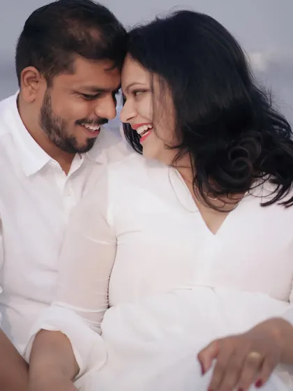 A close-up of their happy faces. The genuine smiles and easy intimacy make this a perfect candid shot.
