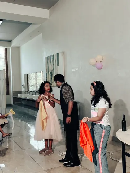 Using colorful silks for a magic trick with two helpers from the audience. This classic of magic is always a hit at children's birthday parties.