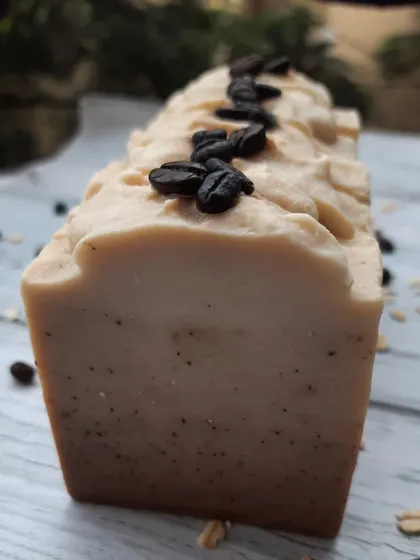 A full loaf of my popular Scrubby Coffee soap, topped with real coffee beans. Made with creamy oat milk and exfoliating coffee grounds, it's an invigorating treat to awaken your skin.