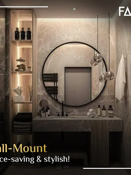 A wall-mounted or floating vanity is a fantastic way to create a sense of space and style. This design combines a sleek, round mirror and pendant lighting with a stone-textured vanity, making the bathroom feel larger and more open.