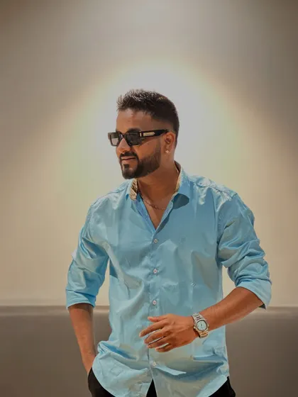 A stylish pose during a private party.