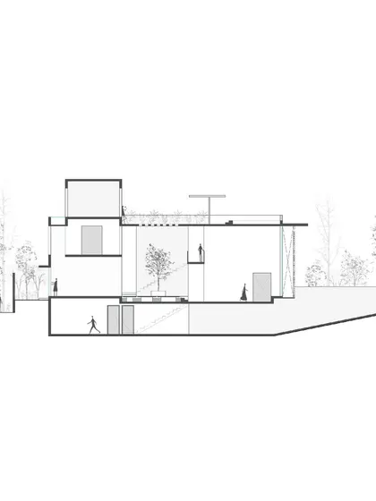 A sectional drawing of the Vikas Residence, showing how the design navigates a sloped site. The drawing reveals the multi-level interior arrangement and the central, light-bringing courtyard.