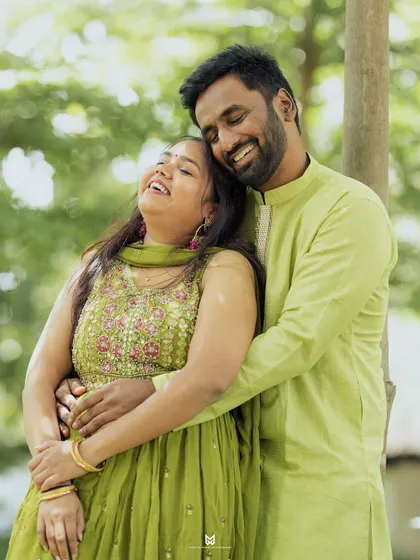 A candid moment of pure happiness between the couple during their Mehandi event. My goal is to capture the authentic emotions you share.