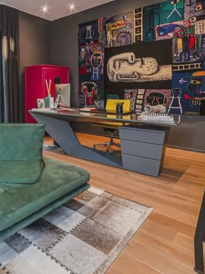 Art isn't just for living rooms. A bold, graphic piece can transform a home office from a purely functional room into a space that inspires creativity and reflects your personal style.