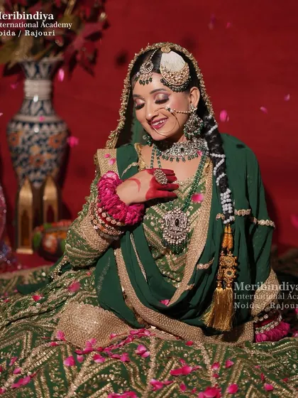 The bride's decorated braid is a central feature in this pose, showing a classic element of South Asian bridal styling.