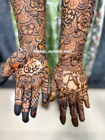 A beautiful combination of the initial 'A' on one palm and the name 'Affan' in Urdu on the other, surrounded by intricate rose designs.