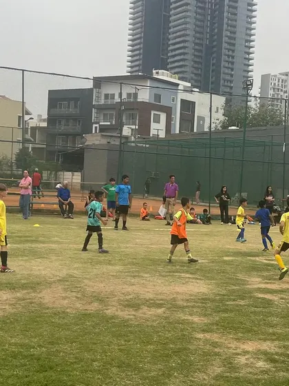 A wide shot of a friendly match. We offer an enriched developmental experience through these competitive opportunities.