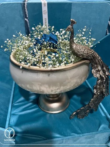 The Peacock Bowl hamper, shown here in a cool-toned blue velvet box. This demonstrates how I can customize the packaging to perfectly match your event's color scheme.