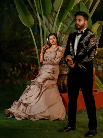 A stylish reception look. We love capturing the glamour and fun of the evening party, from the designer outfits to the happy, candid interactions.
