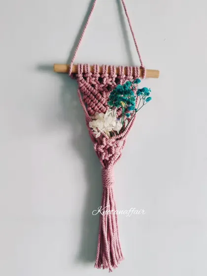 This macrame mini plant hanger is a perfect accessory for your car or a cute add-on to a door or nursery. It can be decorated with dry flowers or a mini succulent.