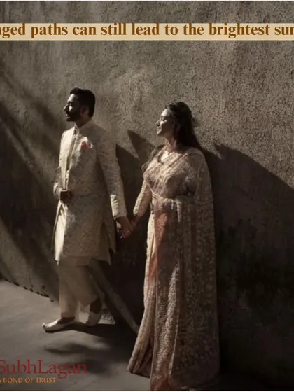 A couple holds hands, standing together against a wall as sunlight streams in. This artistic shot symbolizes that even arranged paths can lead to the brightest future.