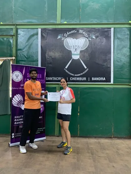 A participant from our adult program is recognized for her performance during the summer camp. We focus on building skills and confidence in every player.