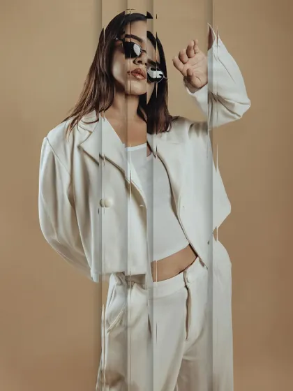 An experimental photo effect. The makeup's clean lines and definition still come through, showing the quality of the application.