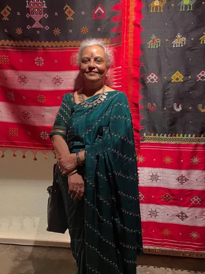 Standing in front of a beautiful display at the Pampa exhibition. My studio is dedicated to preserving and teaching the hand embroidery skills of Karnataka, especially our beloved Kasuti.