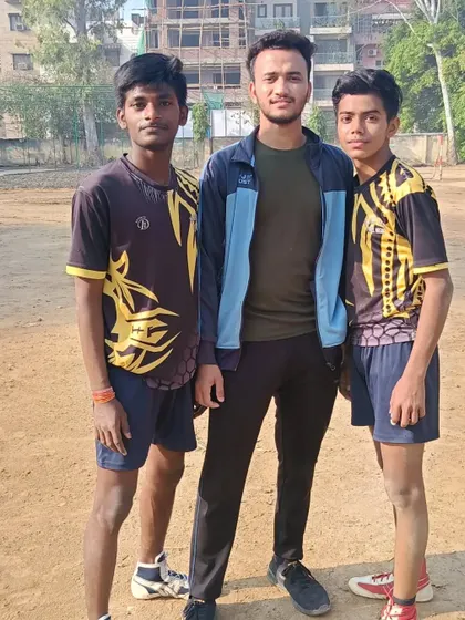 With my two best raiders. I take personal interest in every player's development and help them hone their strengths.